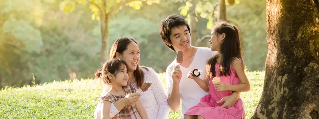 A family of four having ice cream