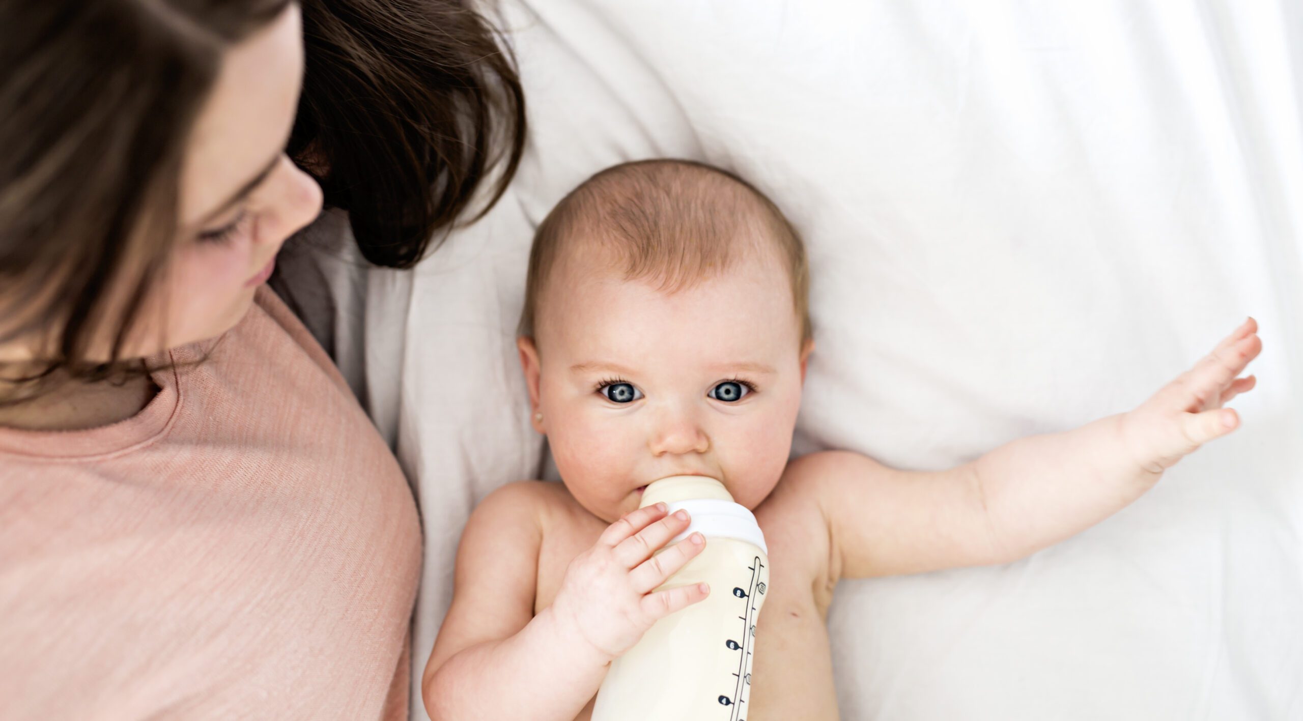 helping baby with Lacteeze